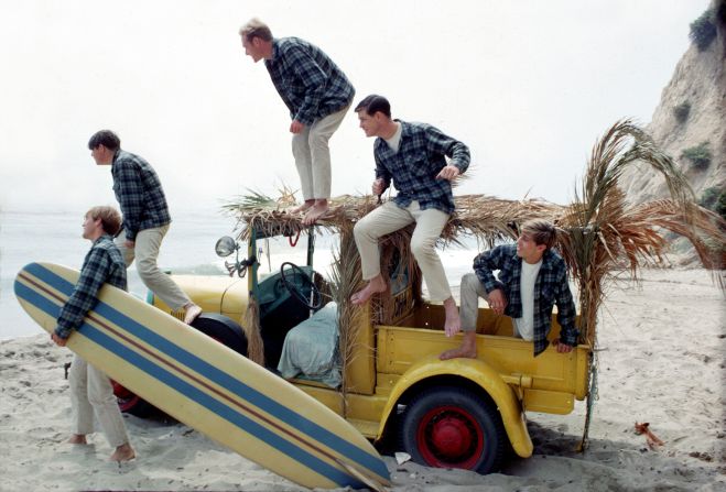 Brian Wilson From The Beach Boys, dead at 82 4 brian wilson The Beach Boys pose for a portrait with a vintage station wagon in Los Angeles in 1962. From left are Dennis Wilson, Carl Wilson, Mike Love, Brian Wilson and David Marks. Carl, Dennis and Brian were brothers.